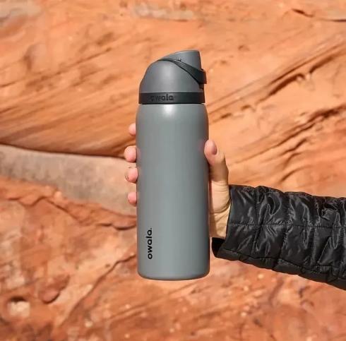 Owala FreeSip 40oz oz Insulated Water Bottle with Push Button Lid, Carry Loop, and Double Wall Insulation for Travel, Sports, and Hiking