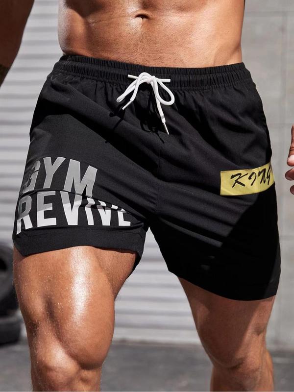 Sporty Men's Letter Print Drawstring Pocket Split Sports Gym Shorts, Loose Casual Elastic Waist Shorts for Running Gym Workout, Men Sport & Outdoor Clothing